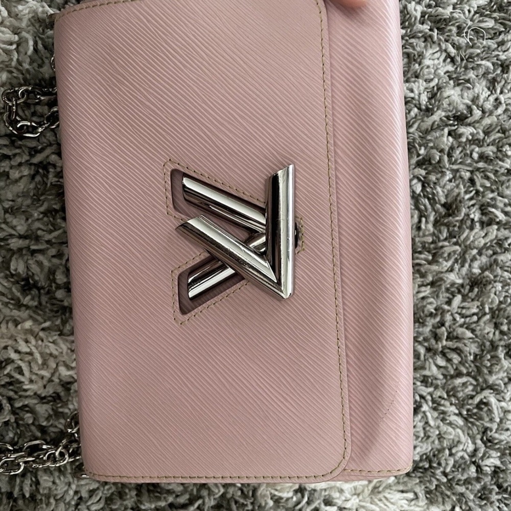Louis Vuitton Light Pink color Epi Twist bag